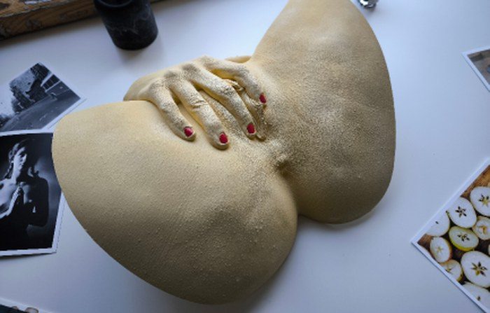 Reclining bare-finish life cast with a resting hand, Athens Series